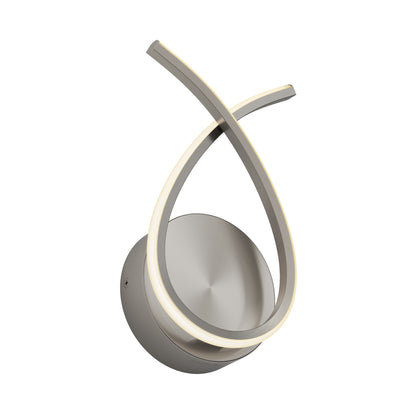 The Artika Gamma modern LED wall sconce 5 CCT features a brushed metal circular base and two curved, intersecting illuminated strips that create an abstract looped design.