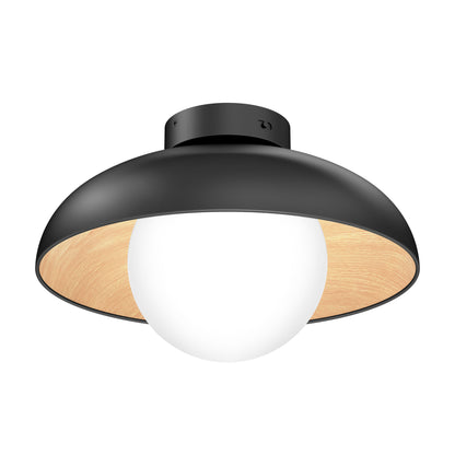 The Artika Boden LED flush mount light 5 CCT features a modern black metal shade, light wood interior, and a central round white glass globe bulb.