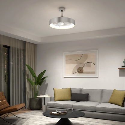 A modern living room with a gray sofa, colorful pillows, a round coffee table, a potted plant, abstract wall art, and a circular ceiling light with a fan. Natural light comes in through large glass doors with sheer curtains.