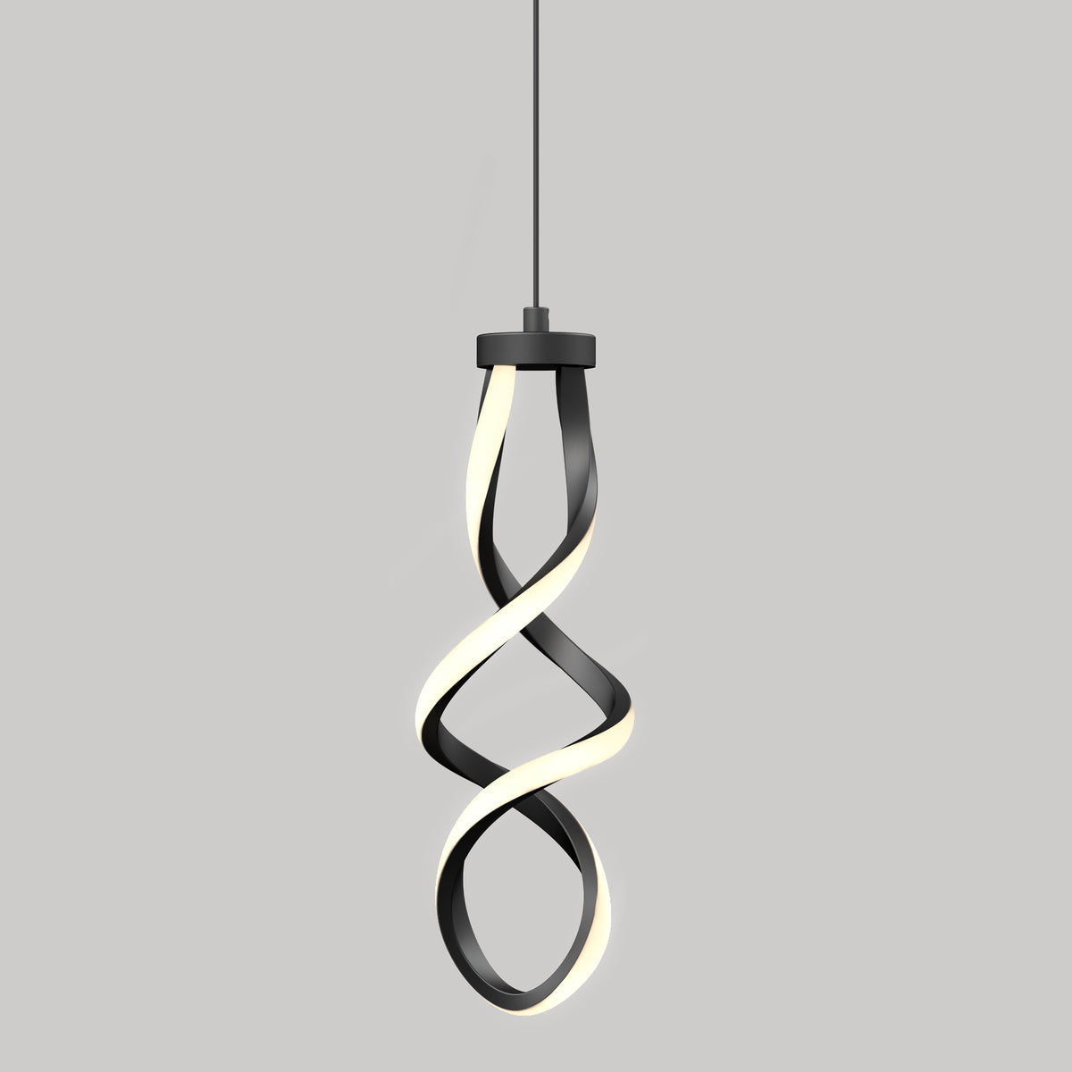 A modern, spiral-shaped pendant light with black and white elements is suspended from the ceiling against a plain gray background. The light emits a soft glow from the inner white strip.