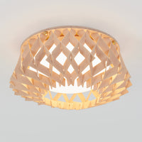 The Artika Kiran 13 in. modern LED flush mount light features a geometric wooden lattice shade that softly diffuses light, adding a warm, modern touch to any white ceiling with its 5 CCT adjustable settings.