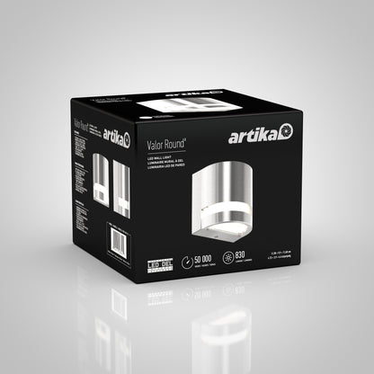 Black packaging box for Artikas Valor Round LED indoor-outdoor wall light, displaying product images, specs like 50,000-hour lifespan and 830 lumens, plus branding and details in white text.