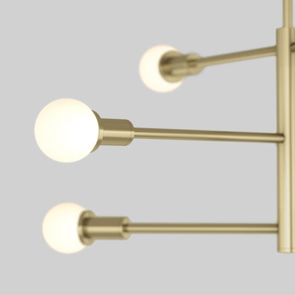 Close-up of the Artika Aristo LED 5 CCT pendant light, featuring three matte gold arms with glowing round bulbs, set against a plain light gray background.