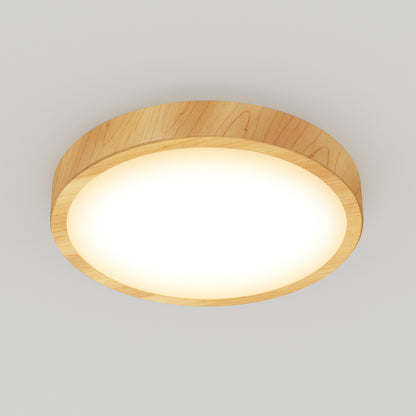 The Artika Dryad 15 in. LED Modern flush mount light features a wooden frame and frosted white cover, ceiling-mounted and glowing brightly against a plain white ceiling.