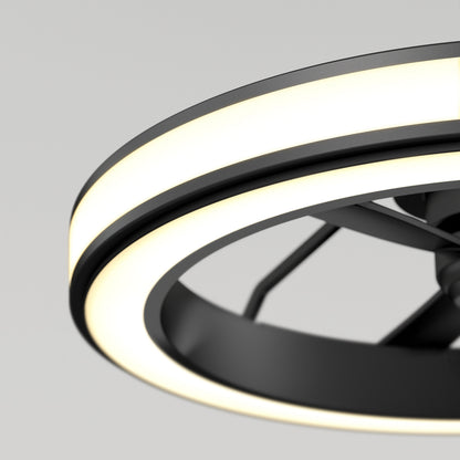 Close-up view of a modern ceiling fan with a circular LED light ring, featuring a sleek black frame and minimalist design against a neutral background.