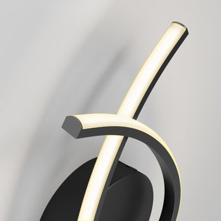 The Artika Gamma modern LED wall sconce 5 CCT features two curved, intersecting illuminated bars and a black circular base, offering adjustable color temperatures and casting a soft glow on any light-colored wall.