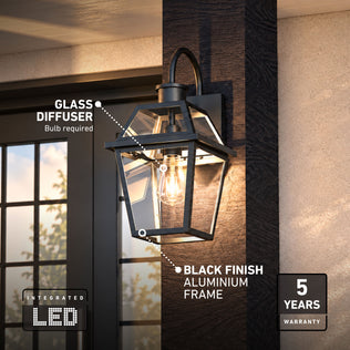 Artika Colonial outdoor lantern with black finish, glass diffuser, exposed bulb, LED icon, and 5-year warranty label on right.