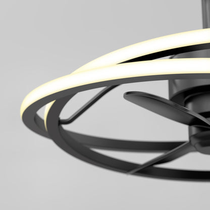 Close-up of the Artika Coda 23 in. LED modern ceiling fan, showcasing its circular LED light kit, dark metal blades, and sleek minimalist design with remote control, set against a light gray background.