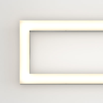 The Artika Dover modern LED bathroom vanity light 5 CCT features a rectangular design with rounded corners, mounted on a plain white wall and emitting a soft, even glow for a sleek, minimalist look.