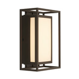 A modern outdoor wall sconce with a rectangular frame in a dark finish, featuring a frosted white glass panel that diffuses light.