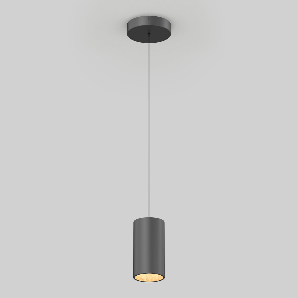 The Artika Alton mini LED pendant light 5 CCT, a modern black cylindrical fixture, hangs by a thin cord and emits a warm glow downward against a plain light gray background.