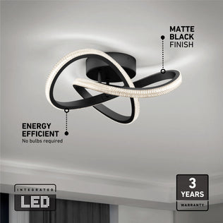 The Artika Morgan modern LED flush mount light 5 CCT features intertwined loops, a matte black finish, glowing edges, energy efficiency, integrated LEDs (no bulbs needed), and a 3-year warranty. Ceiling mounted.