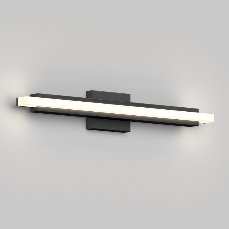 The Artika Ophelia modern LED bathroom vanity light 5 CCT features a black base and glowing bar, ideal for gray bathroom walls.