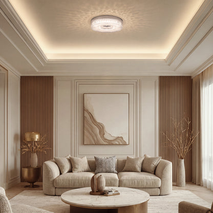 An Artika FM Lysara 15 in. LED Fashion Flush Mount Ceiling Light 5 CCT centered in a neutral-toned living room above a beige sofa.