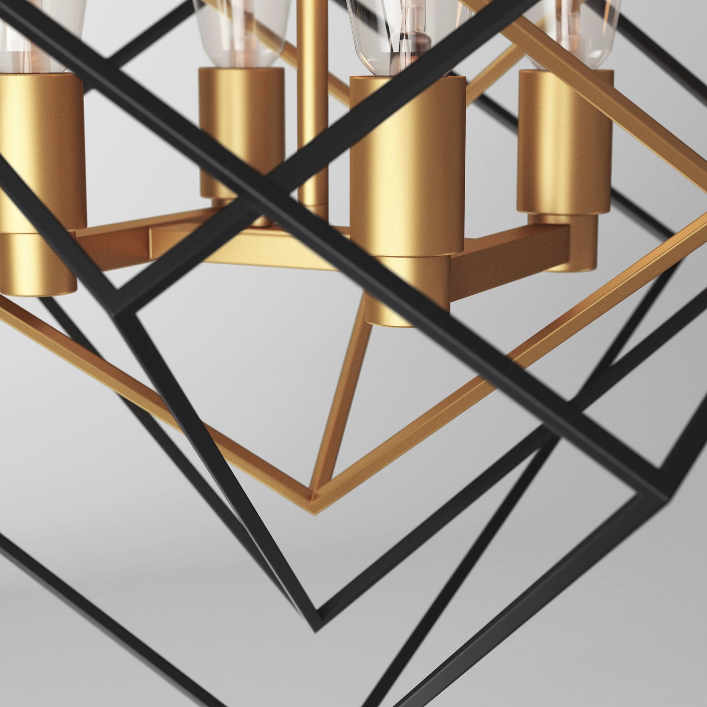 Close-up of the Artika Harmonium modern mid-century pendant light, featuring gold and black metal frames with exposed bulbs, set against a plain white background.