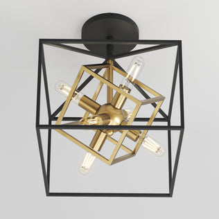 The Imperium flush mount light by Artika showcases exposed bulbs and gold geometric accents within a black rectangular frame, creating a modern statement on any white ceiling.