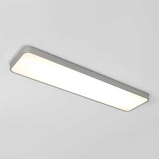 The Artika Europa 48 LED flush mount light features a rectangular white illuminated panel with a slim silver frame, mounted on a plain white ceiling. Includes remote.