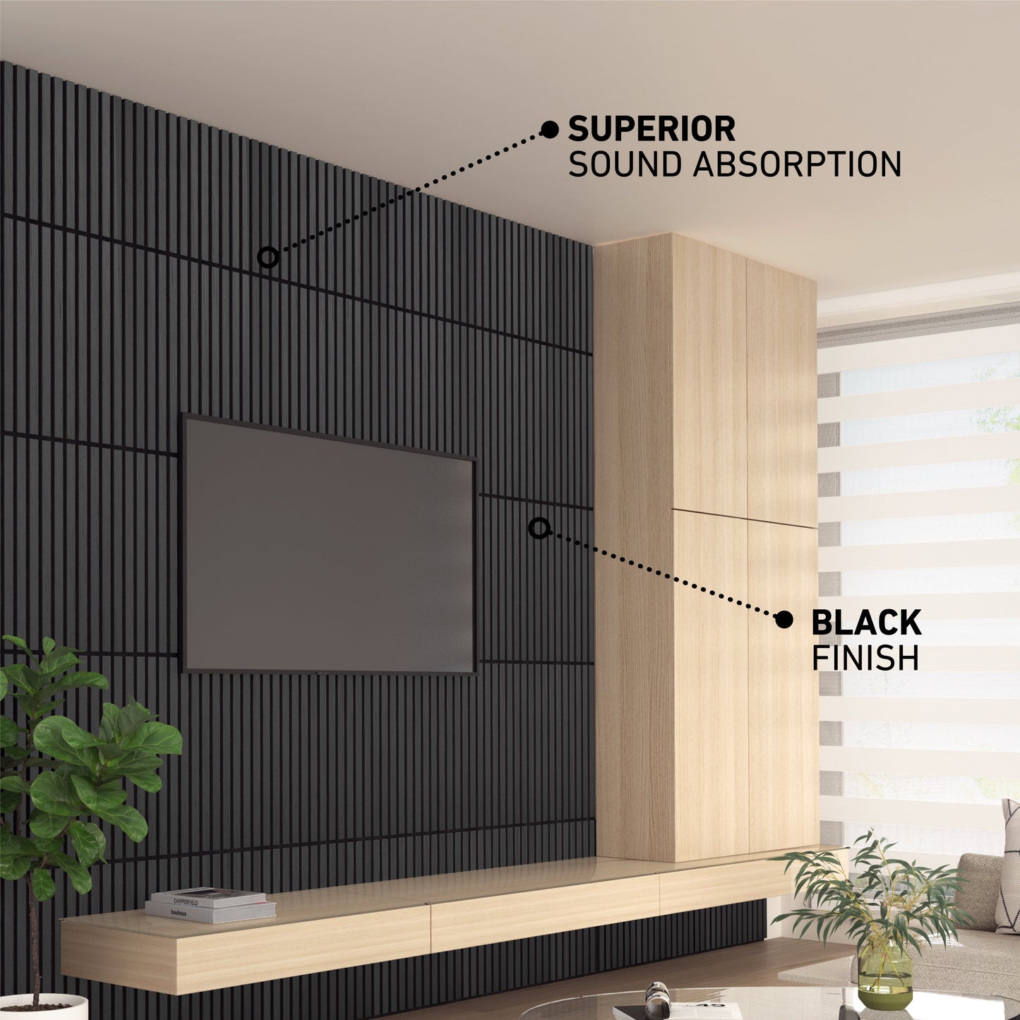 A modern living room features the Artika-CAN-dev Sonolok 15.5 ft sound-absorbing wall panel kit in a black finish, mounted behind a TV, with light wood cabinetry, a large window with sheer blinds, and a potted plant.