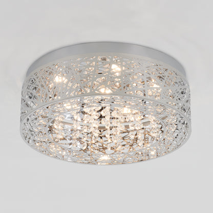 The Artika Crystal Nest LED flush mount is a modern ceiling light with a shiny silver geometric frame and hanging crystal accents, illuminated by multiple LED bulbs.