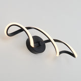 A modern wall sconce with two intertwined, curved LED light strips mounted on a round black base against a plain white wall.