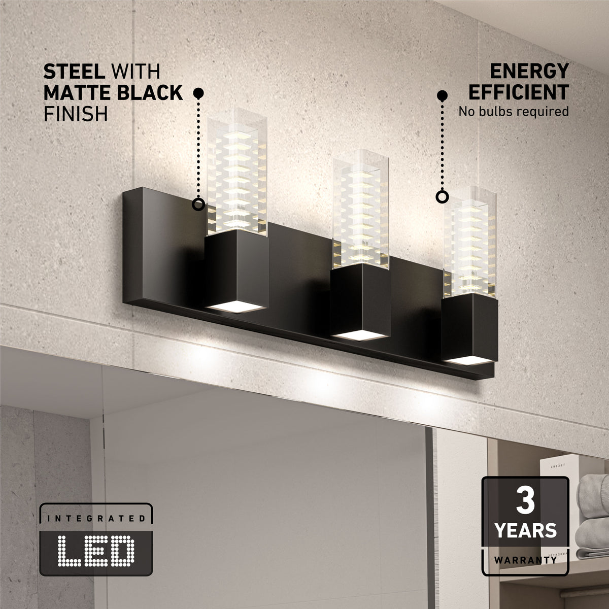 A modern matte black LED wall light with three rectangular fixtures is mounted above a bathroom mirror. Text highlights its steel finish, energy efficiency, integrated LED, and a 3-year warranty.