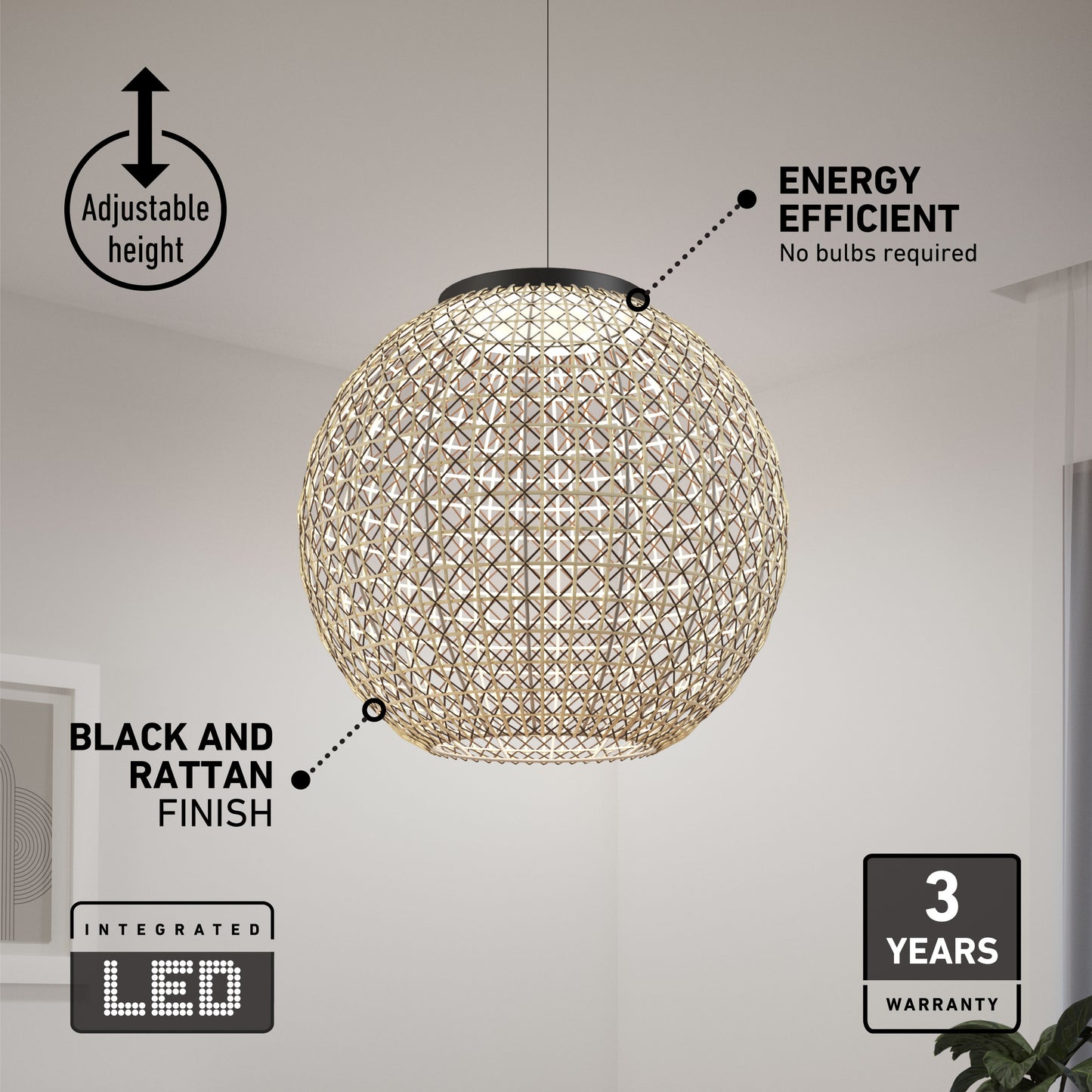The Artika Benson LED pendant light 5 CCT hangs from the ceiling, featuring integrated LED, adjustable height, and a black and rattan finish. Labels show its energy efficiency and 3-year warranty. A picture frame is partly visible on the wall.