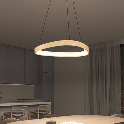 A modern dining room features the Artika Bjorn modern LED pendant light 5 CCT above a wooden table. Four chairs, a minimalist kitchen, and sheer curtains over a window complete the scene.