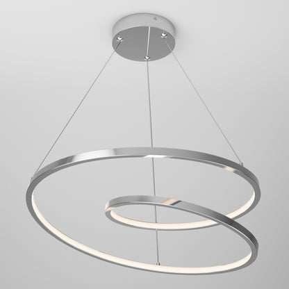 The Salto LED pendant light by Artika features two sleek chrome spiral rings suspended by thin wires, casting a soft glow—an ideal modern lighting choice for a plain white ceiling.