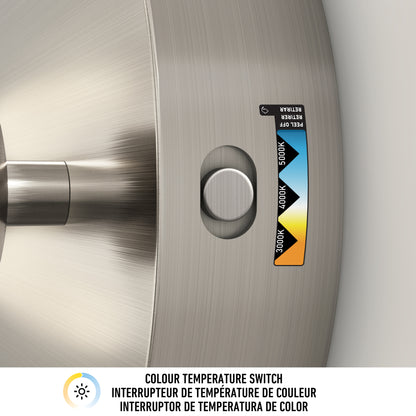 Close-up of the Artika Baldric LED modern bathroom vanity light showing its brushed metal finish, button, and 3 CCT switch label with 3000K (warm), 4000K (neutral), and 5000K (cool). English and French text explains the feature.