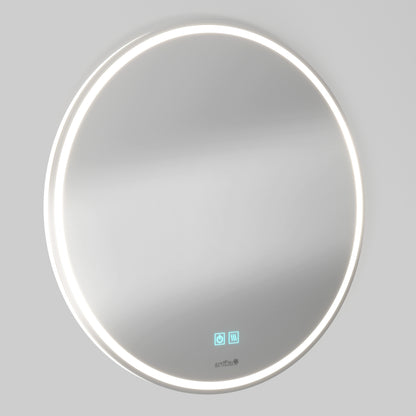 The Artika Emeraude anti fog LED wall mirror is a round, wall-mounted mirror with a built-in LED light ring and blue touch icons on the lower edge for smart features. The background is light gray.