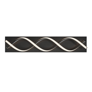 The Artika DNA modern LED bathroom vanity light features a wavy design with integrated LEDs on a rectangular base, isolated on white.