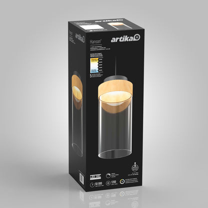 The black box packaging for the Artika Hanson 1-light LED pendant 5 CCT displays an image of its wood and glass design, along with product features and specifications.