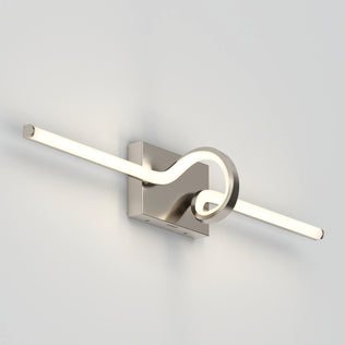 Artika Bowtie modern LED bathroom vanity light, 5 CCT, features a brushed metal base and curved design.