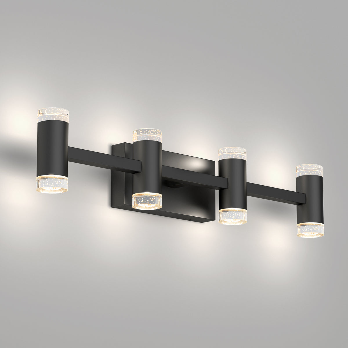 The Artika Mist 26-in Integrated LED 5-CCT Vanity Light Bar features a sleek black design with six cylindrical fixtures on a rectangular base, mounted on a light gray wall. Its frosted glass ends gently diffuse the bathroom lighting.