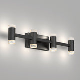 A modern wall-mounted light fixture with six cylindrical LED lights arranged horizontally on a rectangular black metal base, each light featuring a textured, frosted ring at the ends.