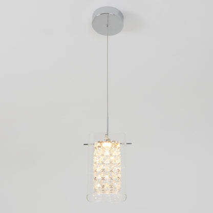 The Artika Crystal Cube 1-light LED pendant features a cylindrical glass shade with crystal-like accents, suspended by a thin wire from a chrome ceiling mount, shown against a plain white background.