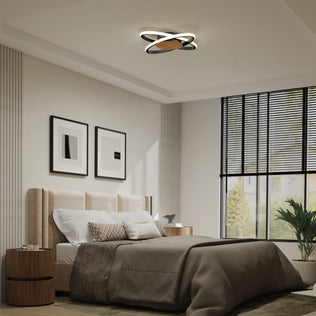 Modern bedroom with beige bed, Artika Atomic 15" LED flush mount ceiling light, wall art, and large window with black blinds.