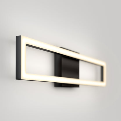 The Artika Dover modern LED bathroom vanity light 5 CCT features a sleek black frame with glowing edges, mounted on a light gray wall and providing soft, even illumination.