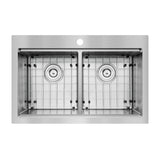 A top-down view of a double-bowl stainless steel kitchen sink with protective metal grids in each basin and a single faucet hole at the back.