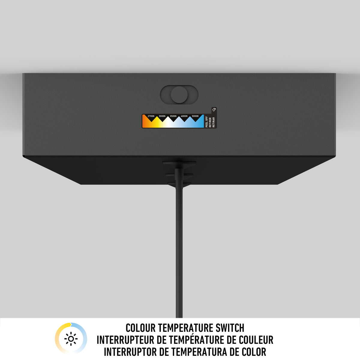 A black box mounted on the ceiling features a color temperature switch with multiple settings. A cord hangs from the bottom. Below is a label indicating Colour Temperature Switch in English, French, and Spanish.