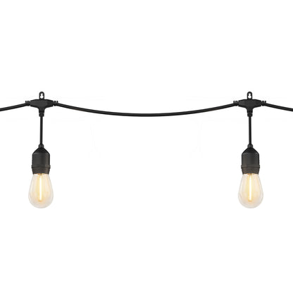 Two Artika Blaze 20 LED Outdoor Solar String Lights with black sockets and exposed bulbs hang on a black cord against a plain white background.