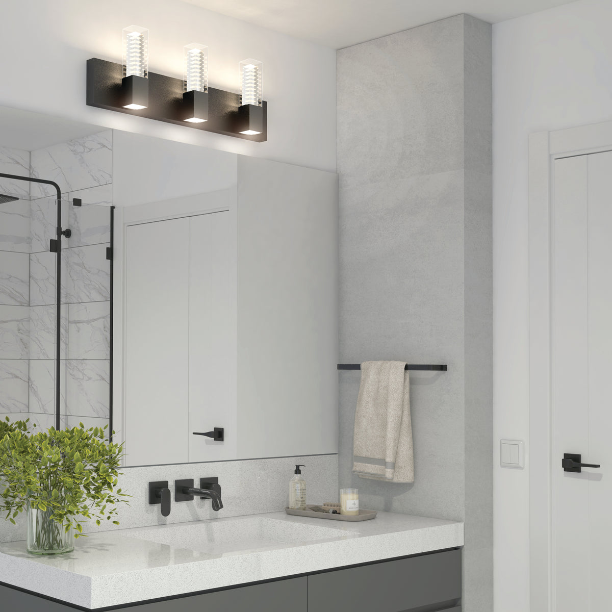 Modern bathroom with a large mirror, Artika Hologram LED 5 CCT fixture, towel rack, white countertop, black fixtures, and green plant.