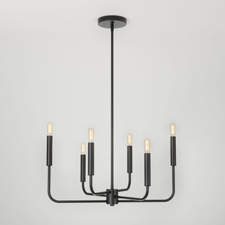 The Artika Manchester 6-light pendant features a modern black finish with six exposed bulbs on straight arms from a central stem, offering a sleek, minimalist look suspended from any ceiling.