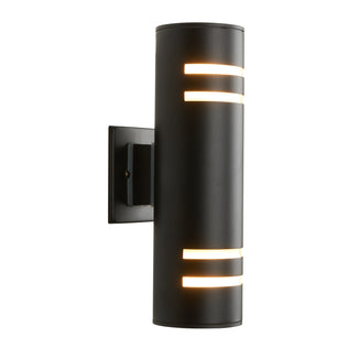 The Artika V3 indoor-outdoor wall light is a modern black cylinder with horizontal slits, casting warm light up and down from a rectangular backplate, shown against a white background.