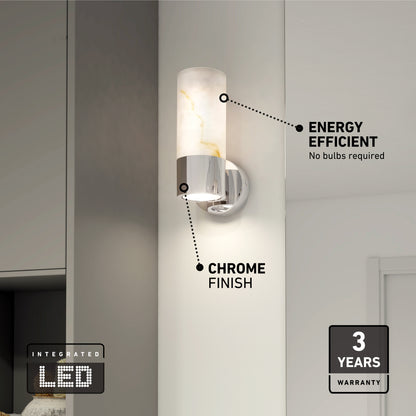 The Artika Marble LED contemporary sconce 5 CCT features a chrome finish and frosted cylindrical shade, mounts on a white wall, offers energy-efficient integrated LED, and includes a 3-year warranty.