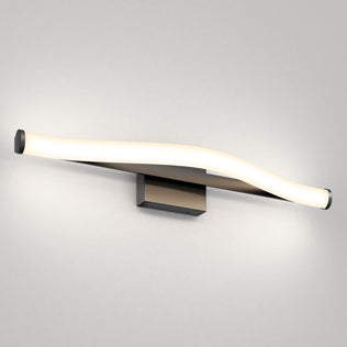 The Artika Arc 27-in LED Vanity Light Bar features a curved, glowing design on a sleek base, perfect for any modern bathroom wall.
