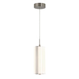 A modern pendant light with a cylindrical white glass shade, suspended by a thin cord from a round, brushed metal ceiling mount.