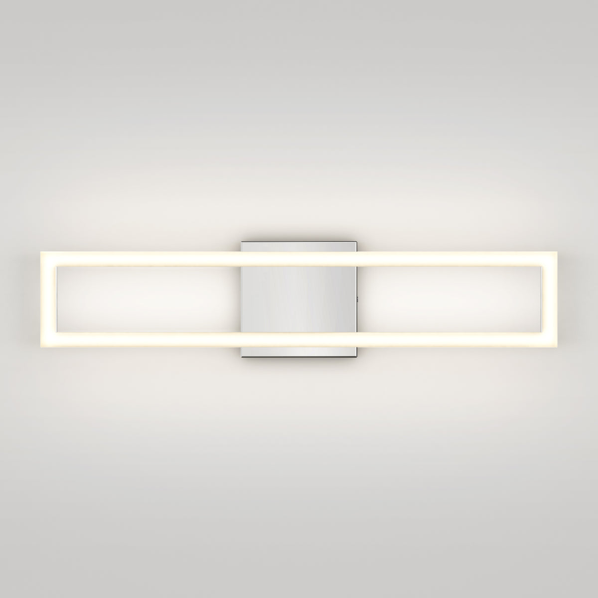 The Artika Dover modern LED bathroom vanity light 5 CCT features a rectangular LED frame on a central metallic square base, offering soft, even white illumination for a sleek, contemporary look.