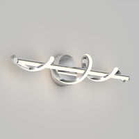 The Artika Coda 27-in (69 cm) Integrated LED 5-CCT Vanity Light Bar features a modern chrome base and two spiraling curved light tubes—an ideal bathroom lighting solution against a light gray wall.