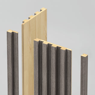 The Artika Panolok 30.67 ft wall panel kit (pack of 8) features upright, interlocking wooden panels with a light wood core and dark grey surfaces, shown against a plain light background.